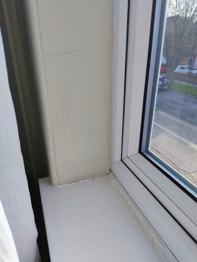 2 - wall crack by bedroom window L.jpg